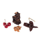 Cherries, raw almonds, Chile peppers, and cluster of chocolate superfood snack